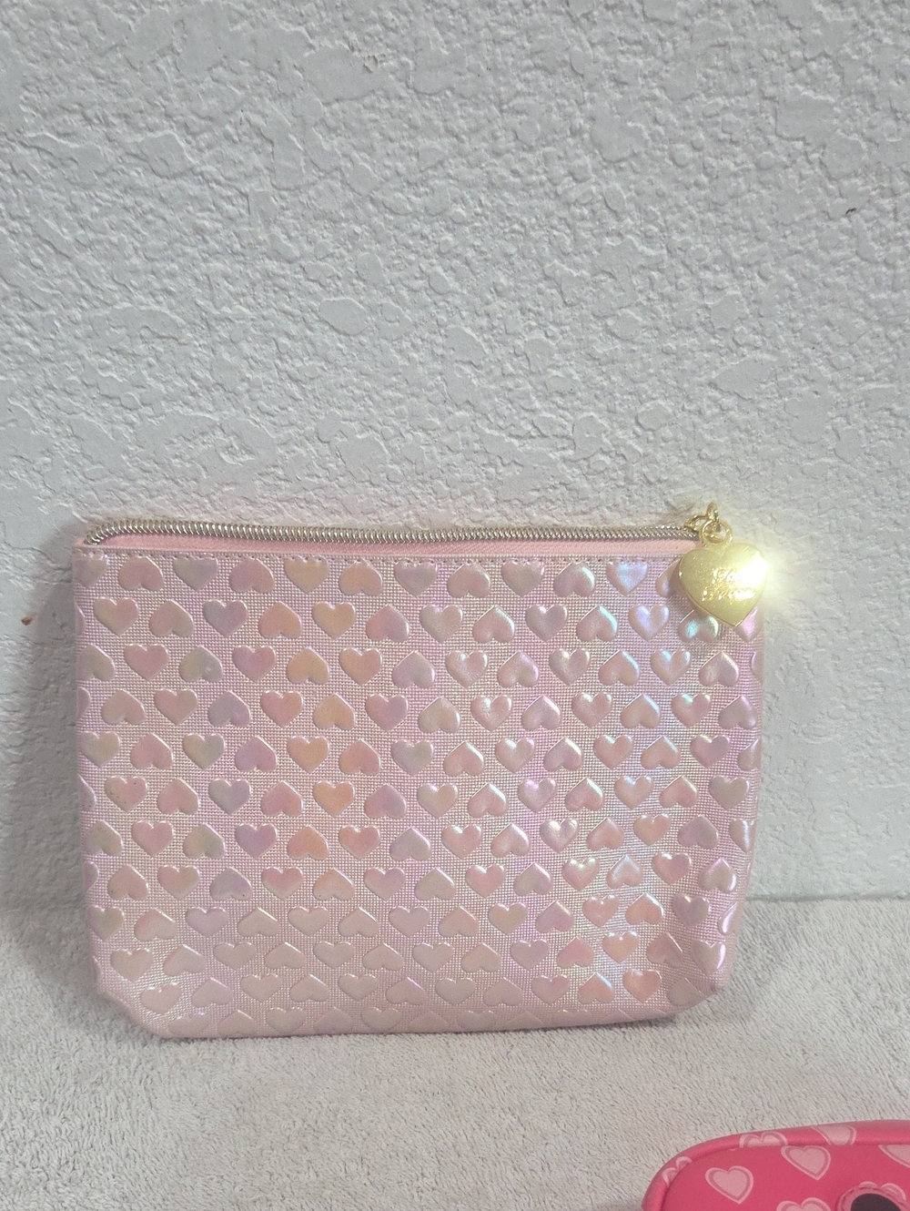 Pink Heart-Patterned Cosmetic Pouch with Gold Heart Charm